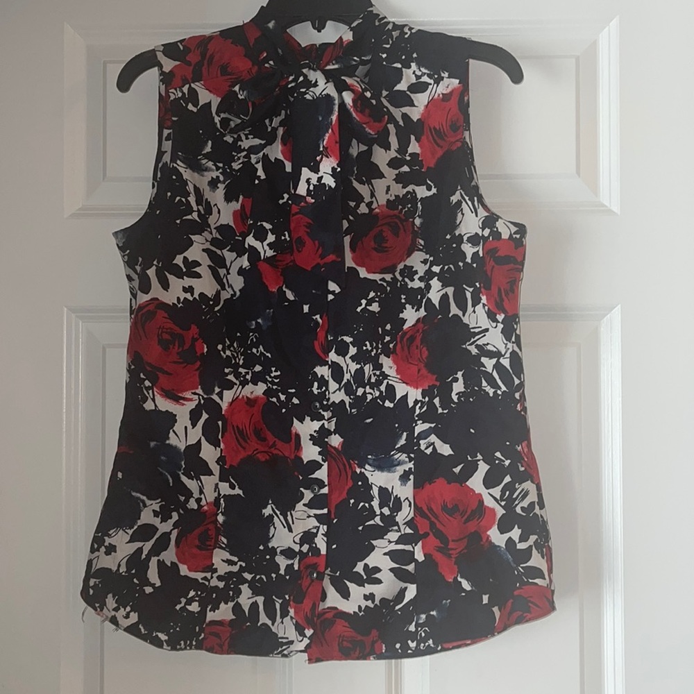 Floral Print Blouse with Bow tie neck.
